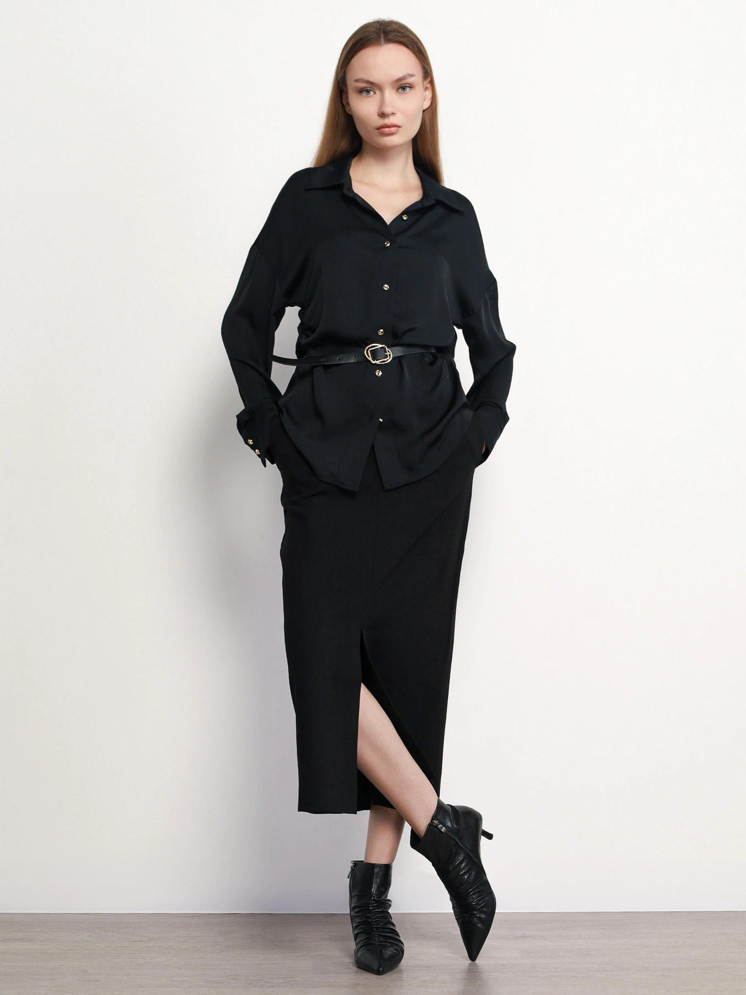 Блуза черного цвета с рюшами